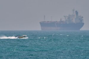 Oil prices jump as US, Iran trade fire in Strait of Hormuz