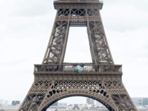 Activists hang Palestinian flag on the Eiffel Tower for Nakba Day
