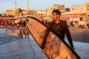 Gaza’s surfers seek solace from war in the Mediterranean Sea