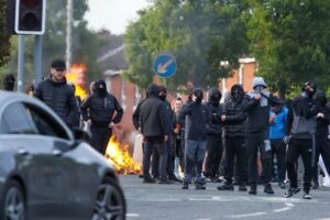 Why has Belfast erupted in anti-immigrant violence after a knife attack?
