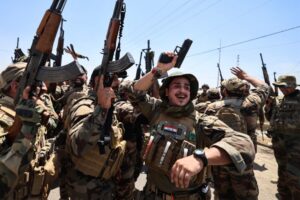 Iraq’s paramilitary groups say they will disarm. Will that ever happen?