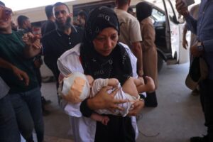 Israel kills three Palestinians in Gaza as attacks on tents continue