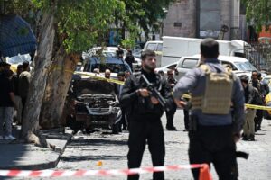 Bomb attacks rattle Damascus but for most Syrians, life goes on