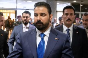 Iraqi PM heads to US seeking balance between security and economy