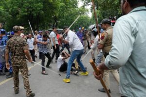 Photos: Police fire tear gas at India’s Cockroach movement supporters