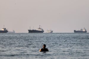Tanker on fire off coast of Oman after being hit by projectile