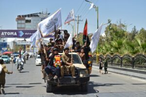 Photos: Patriotic music and flags mark Taliban rule anniversary in Kabul